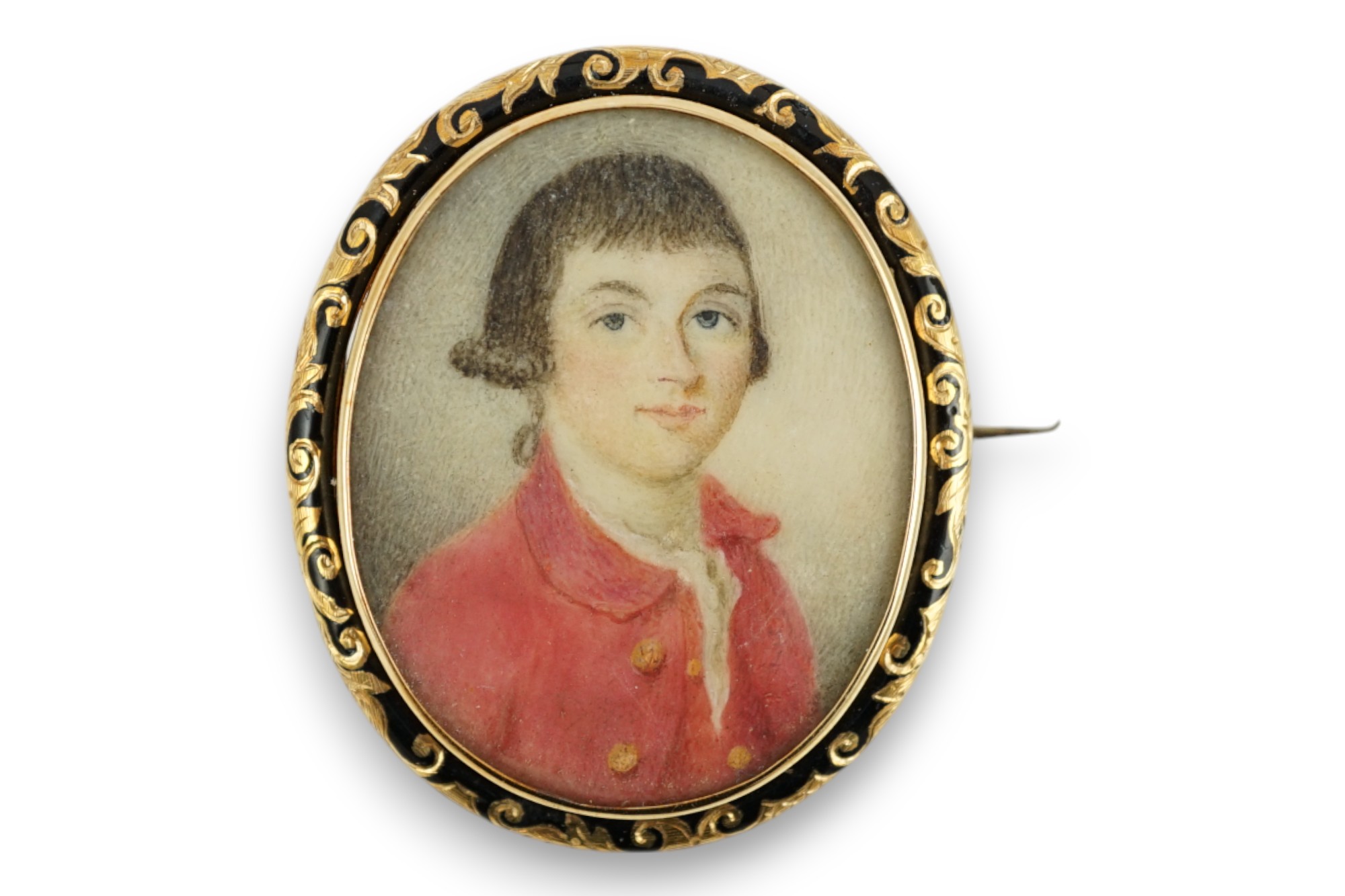 A 19th century yellow metal and black enamel mounted oval portrait miniature of a young gentleman, 42mm.